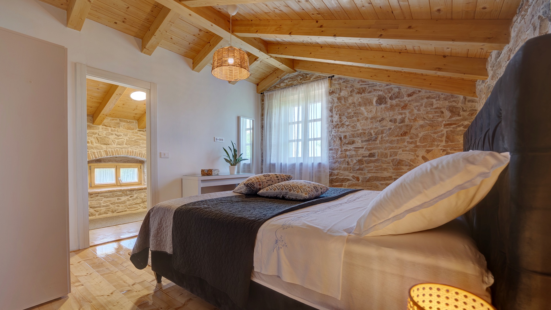 Bedroom 1 — side angle with en-suite view