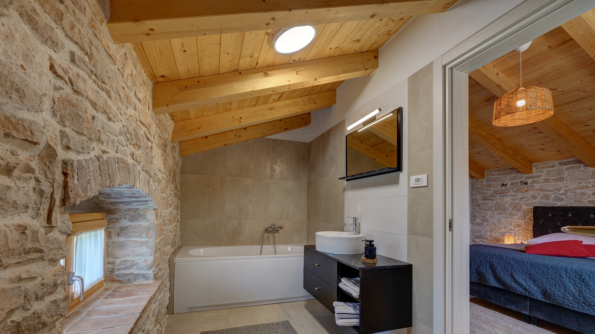 Bedroom 2 — stone wall & wood ceiling detail