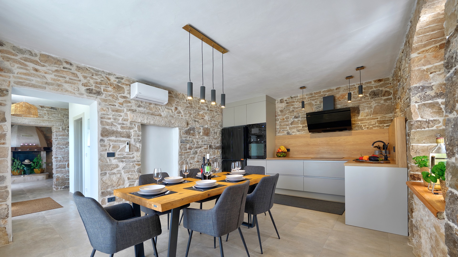 Kitchen & dining room — open plan stone walls