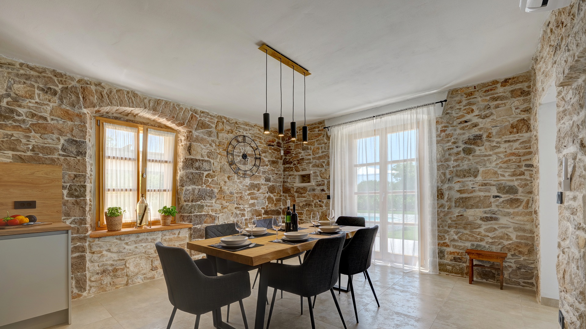Dining room — stone walls & garden windows
