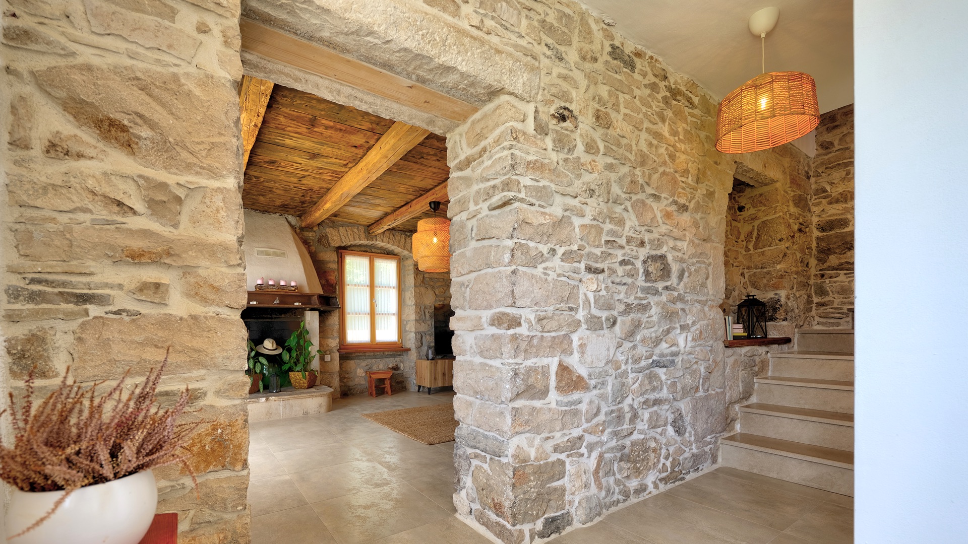 Entrance — stone arch view to living room
