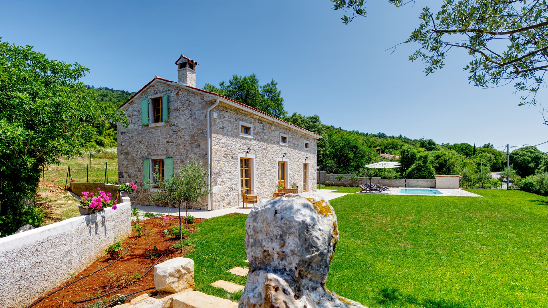 Villa with lush green garden